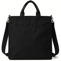 Sac bandoulière minimaliste noir avec poche avant, sangle amovible, sac en toile pour les trajets quotidiens, pour le travail, le bureau