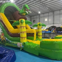 Toboggan aquatique gonflable sur le thème du monde des dinosaures préhistoriques avec décorations de palmiers pour événements commerciaux