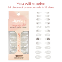 Faux ongles à presser faits main en ABS, forme amande, longueur moyenne, design 3D de luxe avec strass, style Ins, pour soirées et événements.