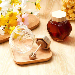 Wholesale Hexagon-Shaped Clear Glass <b>Storage</b> Honey Jar with Bamboo Wood Lid Custom Logo for <b>Kitchen</b> Use - Product Image 1