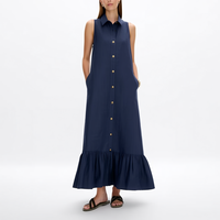 Gaun kemeja midi wanita custom grosir warna biru navy tanpa lengan, kerah runcing, kancing depan, saku samping, dan detail ruffle bertingkat.