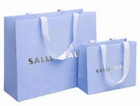 Sac en papier kraft de luxe imprimé sur mesure avec cordon de serrage, design personnalisé fait main, emballage pour vêtements de boutique, vente en gros d'usine
