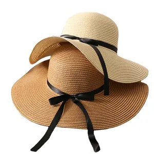 Venta al por mayor señora playa visera mujeres bohemio ala ancha sombrero de paja plegable ala grande gorra de protección UV con lazo para mujer