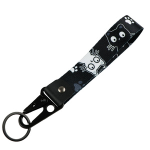 Correa de poliéster mate con estampado de pata de gato de dibujos animados en blanco y negro, clip de águila, llavero de gatito, regalo para amantes de los gatos - Product Image 3