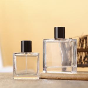 Vente flash, prix bas, flacon pulvérisateur <span class=keywords><strong>de</strong></span> <span class=keywords><strong>parfum</strong></span> en verre transparent carré plat <span class=keywords><strong>de</strong></span> 50 ml et 100 ml avec bouchon noir - Product Image 1