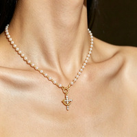 Collier de perles croisées personnalisé, tendance et de luxe léger, style rétro simple, best-seller transfrontalier Europe-Amérique