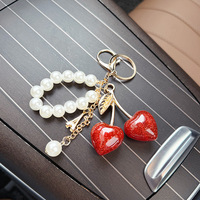 Schattig parelbandje hars hartvormig kersen sleutelhanger voor tas charme designer mode fruit hanger autosleutel hanger accessoires