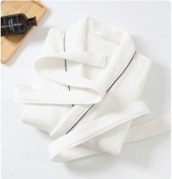 Peignoir en coton pur avec logo personnalisé, tissu extérieur gaufré épaissi doux pour la peau et intérieur en tissu éponge, idéal pour les hôtels et les spas