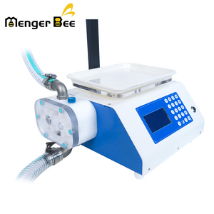 Machine de remplissage automatique électrique haute productivité et économe en énergie en acier inoxydable pour miel et eau, avec moteur, pour bouteilles de boissons - Product Image 3
