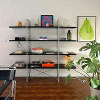 Étagère de présentation multi-niveaux sans dossier en métal, style nordique, inspirée du design minimaliste moderne, pour rangement simple
