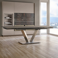 Table à manger pliable 6 places, design moderne et luxueux, pieds en métal, plateau en céramique, verre trempé.