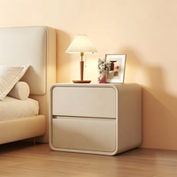 Table de chevet minimaliste moderne avec glissières silencieuses, coins arrondis et design compact pour le rangement de la chambre à coucher