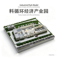 Maquette d'usine de parc industriel avec immeuble de bureaux, atelier, zone de stationnement, routes et ceinture verte