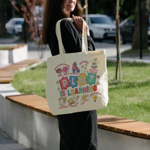 Borsa tote in tela con puzzle a tema cartoni animati "Giocare è imparare", borsa a tracolla riutilizzabile per la spesa, regali di apprezzamento per gli insegnanti della scuola materna - Product Image 2