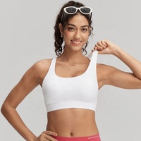 Soutien-gorge de sport respirant et doux pour la peau, maintien moyen, avec coussinets rembourrés, antichoc, dos croisé, pour le yoga et le fitness, pour femme