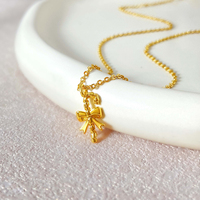 Collier pendentif nœud papillon 3D plaqué or 18 carats hypoallergénique pour femme, chaîne délicate en forme de ruban, vente en gros