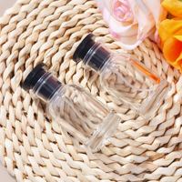 Bouteilles de parfum de luxe personnalisées OEM/ODM en gros, logo personnalisé, bouteilles de parfum vides transparentes professionnelles 25ml
