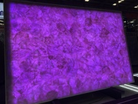 Dalles de marbre rose translucides rétroéclairées de grande taille pour murs et comptoirs