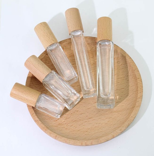 Transparent bottle with primary-color beech cover