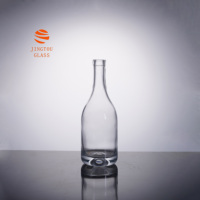 Bouteille de liqueur en verre transparente ronde classique de 500 ml, fond épais, bouteille en verre vide pour whisky, brandy, vodka, logo personnalisé, approvisionnement en gros