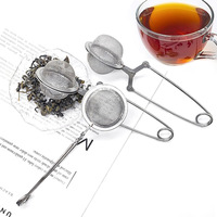 Infuseur à thé réutilisable en acier inoxydable 304 avec tige poussoir, filtre à thé en forme de boule à long manche, maille fine, moderne, pour vente en gros
