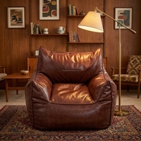 Fournisseur d'usine OEM : Fauteuil de relaxation en cuir luxueux avec repose-pieds, ensemble pouf marron avec ottoman pour la détente