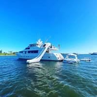 Glissière d'eau flottante gonflable géante commerciale pour bateau de yacht et ponton de piscine pour des occasions de mer et d'école