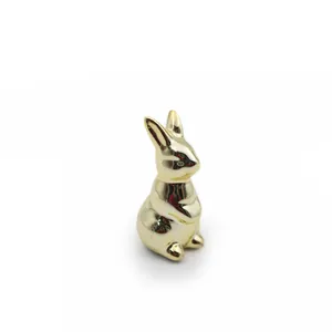 Pascua adorno soporte de oro de cerámica, estatuilla de conejo