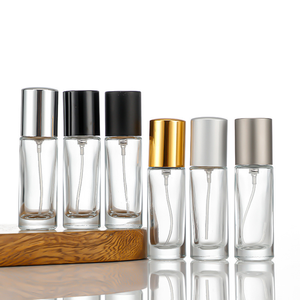 Bottiglie di profumo rotonde e cilindriche all'ingrosso da 10 ml. Mini bottiglie di vetro di profumo vuote di alta qualità. - Product Image 1