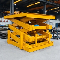 Plateforme élévatrice électrique fixe pour le levage de marchandises avec entraînement hydraulique pour une élévation stable des charges