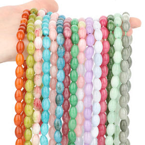 Neuankömmling 8-<span class=keywords><strong>12mm</strong></span> lange Reis Perlen in ovaler Form Glatte natürliche Aventurin Achat Fass Reis Edelstein Perlen für die Schmuck herstellung - Product Image 1