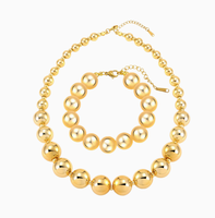 Parure de bijoux fantaisie pour femme en acier inoxydable, collier et bracelet à chaîne perlée, avec billes dorées graduées et sphères rondes polies