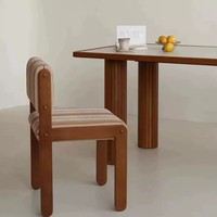 Chaise de salle à manger rétro mi-siècle avec dossier en bois massif et assise rembourrée, idéale pour petit appartement et usage domestique