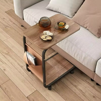 Mesa de centro lateral moderna simple del lado de la sala de estar multiusos para el diseño interior con la rueda