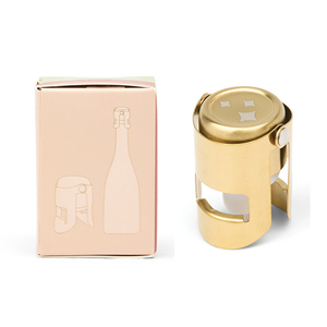 Bouchon de champagne en métal couleur or pour la conservation du vin - Product Image 1