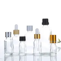 30ml 330pcs clear glass skincare bottles with plastic bamboo rubber dropper cap for lotion