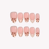 Faux ongles en acrylique à presser, motif petite fleur, style Lait-Café, base rose nude, French blanc crème, décorations peintes à la main motif fleur de café, points et tourbillons