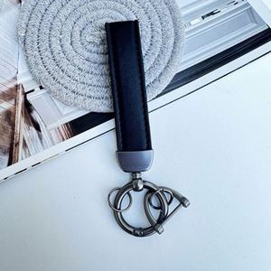 Porte-clés créatif en PU pour voiture, personnalisable avec logo imprimé, anneau de clés en fourrure, cordon de ceinture, pendentif pour cadeaux originaux – Vente en gros - Product Image 3