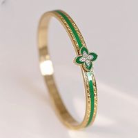Bracelet ouvert géométrique en acier inoxydable plaqué or 18 carats avec émail et zircon, motif trèfle à quatre feuilles, anti-décoloration, bijoux de luxe pour femmes