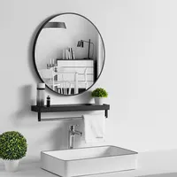 Круглое зеркало для ванной комнаты с полкой