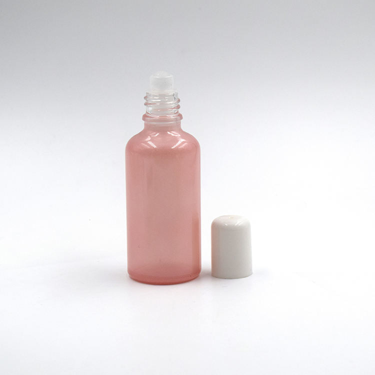 Bottiglia di plastica rosa + tappo bianco