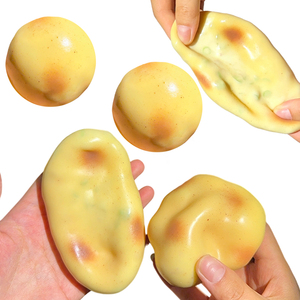 Jouet à presser pomme de terre de simulation avec blocs de construction, bruit croquant, non toxique, en TPR, boule anti-stress souple - Product Image 1
