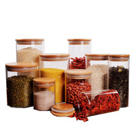 Fourniture de couvercle en bois de bambou pot de stockage en verre assaisonnement thé pot de fruits secs pour l'utilisation de fête stockage des aliments bouteille en verre artisanale