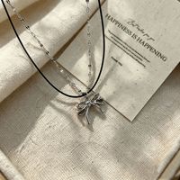 Nouveau Collier Sportif Femme 2026 en Acier Inoxydable avec Chaîne Bambou, Double Couche, Cordon Noir et Nœud Délicat Pailleté – Idéal pour Usage Quotidien