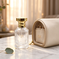 Vente en gros de flacons de parfum en verre transparent blanc cristal de 30 ml avec bouchon en métal doré brillant pour emballages de parfums de luxe