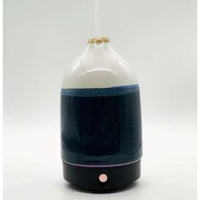 Diffuseur de brume ultrasonique avec glaçure réactive