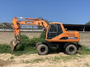 Excavadora de Ruedas Doosan DH150w de 15 Toneladas, Fabricada en Corea del Sur, Modelo 2015, Motor y Bomba Usados, 4001-6000 Horas, Capacidad de Cucharón de 0.75m - Product Image 4