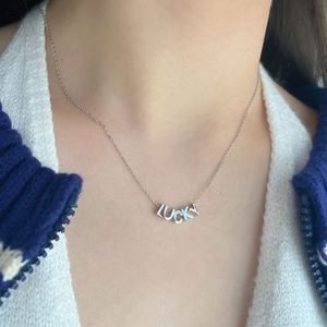 Collar de Moda Dylam con Colgante de Letra del Alfabeto A-Z y Corazón, en Plata de Ley 925 con Baño de Rodio y Oro de 18K - Product Image 4
