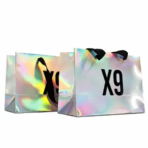 Venta caliente bolsas de papel de compras holográficas de lujo personalizadas para la colección Boutique bolsas de embalaje de regalo