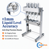 Machine de remplissage de parfum semi-automatique pneumatique à pression négative sous vide pour liquides huileux avec contrôle de niveau du verre et 2/4/6 buses